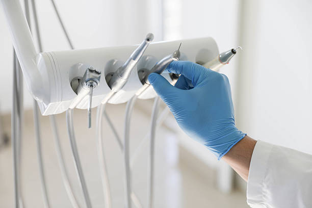 Professional Tooth Extraction technician working in Sevier County County, AR